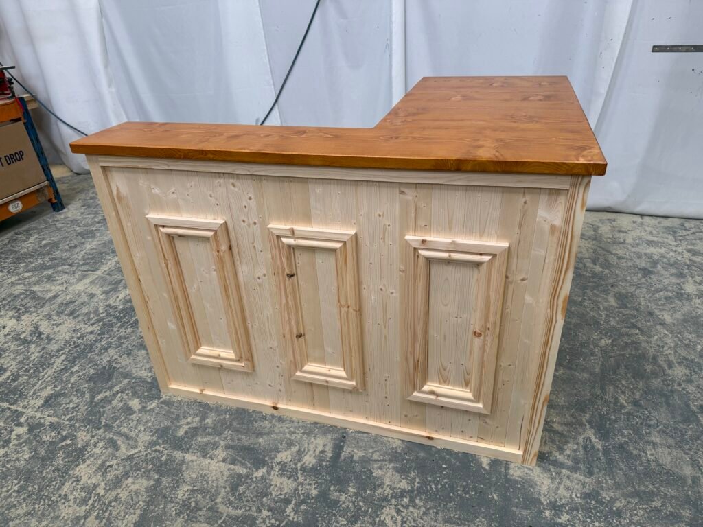 Luxe Satin natural wood home bar integrated into modern home space, warm timber tones highlighted by ambient light, spacious serving top ready for entertaining