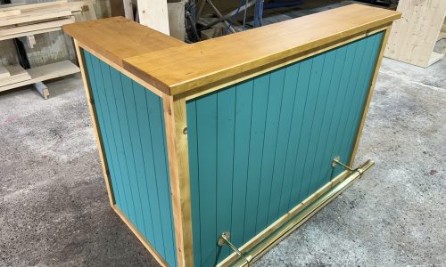 Vibrant corner entertaining with Vintage Satin Edge Teal Martini 140x80 L-shape home bar and foot rail