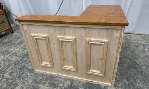 Luxe Satin natural wood home bar integrated into modern home space, warm timber tones highlighted by ambient light, spacious serving top ready for entertaining